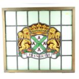 Stain glass framed section which originally formed part of DUNN & CO Gentlemens outfitters shop Plym