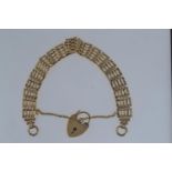 9ct gold gate link bracelet with a heart-shaped padlock clasp, hallmarked London, 15.5 grams