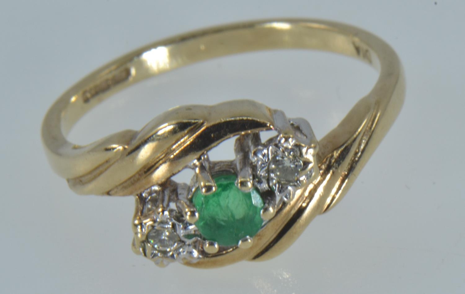 9ct gold, emerald & diamond crossover ring, size L1/2, gross weight 2.1 grams 