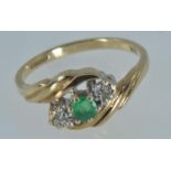 9ct gold, emerald & diamond crossover ring, size L1/2, gross weight 2.1 grams