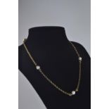 Yellow metal and pearl necklace, tests positive for 9ct gold, circumference 400mm, gross weight 6.45