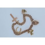 9ct rose gold bracelet with a heart-shaped padlock clasp, suspending four charms, including three 9c