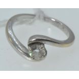 Diamond solitaire crossover ring, testing positive for 18ct white gold approx. 0.35 carat, size H, g