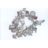 Silver & white metal charm bracelet, gross weight 74.5 grams