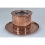 Newlyn copper ink well with scalloped decoration, marked 'Newlyn', complete with glass well, diamete