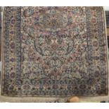 Large floral silk rug. 186cm x 285cm
