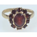 9ct gold & garnet cluster ring, size O, gross weight 2.75 grams