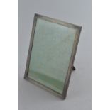 Silver rectangular engine-turned photo frame, maker's mark rubbed, Birmingham 1928, 22.5 x 17.5cm