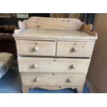 Two over two drawers stripped pine chest. W90xD47xH109cm