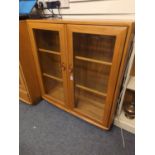 Ercol Glazed book case with two internal bookshelves Light finish W91cm D33cm H101cm