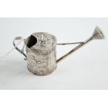 Miniature silver watering can with embossed with figures and scrolling, import marks for London 1900