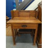 Oak Arts and Crafts wash stand with single drawer, tapered legs and heart detail W77 x D45 x H77cm