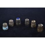 Six silver thimbles, various makers and dates, including one by James Swann & Son Birmingham 1976 wi
