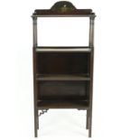 Small hardwood oriental style shelving unit with painted panel to small gallery and to outside of si