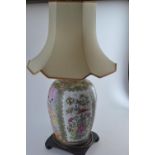 Large C20th Chinese famille rose ginger jar converted to a table lamp, four panel decoration depicti