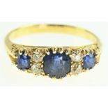 18ct gold sapphire and diamond ring, central sapphire diameter measures 5mm x 5mm, size Q1/2, gross