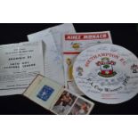 A Southampton Football Club plate with printed signatures commemorating 1976 FA Cup win against Manc