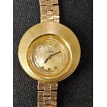 Omega ladies 18ct gold watch on a 9ct strap  . Gross weight 24g. running