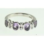 18ct white gold, amethyst and diamond ring, size M, gross weight 4.93 grams