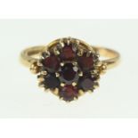 9ct gold and garnet cluster ring, size O1/2, gross weight 3.38 grams