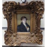 Miniature portrait of a gentleman in a gilt frame. Painting size 9.5cm x 7cm. overall size 18cm x 20