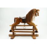 Horseplay of Devon England wooden rocking horse L139 H120 cm approx.  With makers label, saddle and