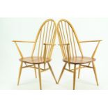 Pair of Ercol 365A Quaker armchairs. Natural finish, with original seat pads.