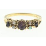 9ct gold ring set with amethyst and opals, size N1/2, gross weight 3 grams