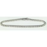 18ct white gold and diamond line bracelet, the diamonds together weighing approximately 4.85 carats,