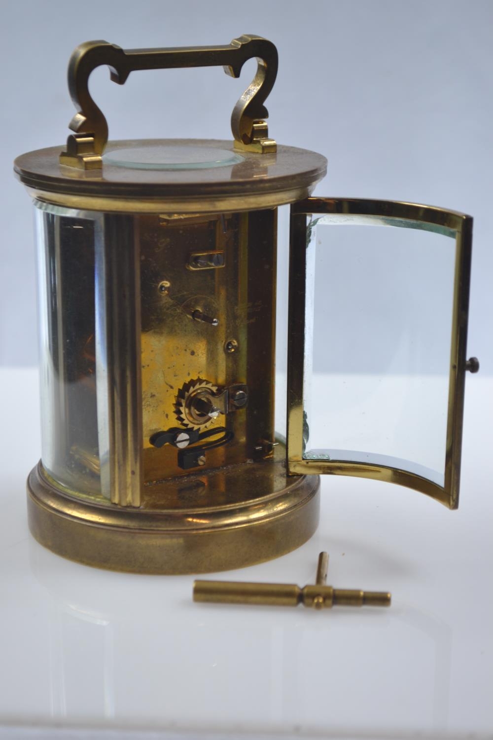 Brass and glass cylindrical carriage clock by the Chester Carriage Clock Company, dia. 9.5 x H15cm - Image 3 of 7