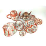 Ten pieces of Japanese Kutani ceramics inc. teapots, plates etc. tallest 21cm