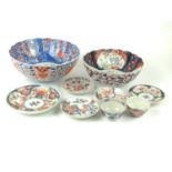 Two Japanese bowls, 5 plates & 2 small cups, largest bowl D25cm x H11cm