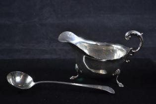 Georgian silver sauce ladle, maker's mark unclear, and a silver sauce boat, S Blanckensee & Son Ltd,