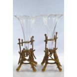 Two glass vases in gilt bamboo four footed stands, tallest 26cm