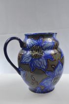 Carltonware handcraft, blue abstract floral jug. Height 20.5cm.