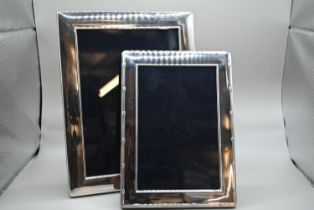 Two rectangular silver photo frames, Carr's of Sheffield Ltd, Sheffield 2002 and 2003 respectively,