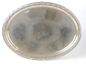 German silver oval presentation tray, with moulded border, inscribed 'Presented to H. Mason Hon Sec.