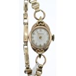 Marvin 9ct gold cased and strapped ladies watch, width of face 12mm, weight minus watch mechanism 8.