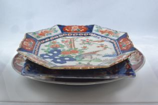 Six Imari patterned platters, oval platter 36cm x 27cm