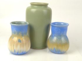 Two Ruskin blue glazed vases with impressed marks to base, one signed and dated 1931, height 15cm to