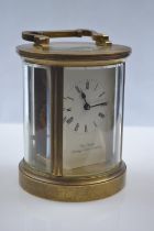 Brass and glass cylindrical carriage clock by the Chester Carriage Clock Company, dia. 9.5 x H15cm