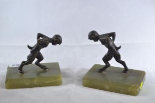 Pair of bronze and onyx faun bookends, height 11.5cm, length 13cm