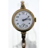 9ct gold cased ladies watch on 9ct gold sprung link strap, subsidiary seconds and enamel face dia. 2