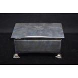 Silver footed cigarette box, Hawksworth Eyre & Co Ltd, Birmingham 1912, initialled to cover, 14.5x7x