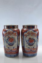 Pair of Japanese Imari vases, height 24cm, dia. approx. 14cm