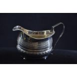 George III silver creamer, maker's mark rubbed, London 1814, length 14cm, 137.2 grams