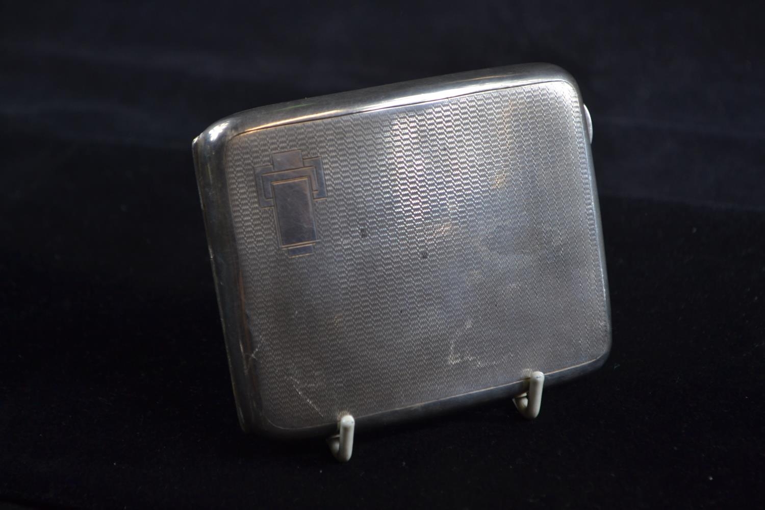 Silver engine-turned cigarette case, W H Haseler Ltd, Birmingham 1935, 10 x 8.5cm, gross weight 126 