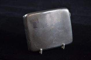 Silver engine-turned cigarette case, W H Haseler Ltd, Birmingham 1935, 10 x 8.5cm, gross weight 126