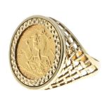 A 1982 half sovereign set in 9ct gold ring. Size T. Weight 8.9g