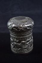 Indian white metal cylindrical tea caddy, embossed with various animals, unidentified mark to caddy